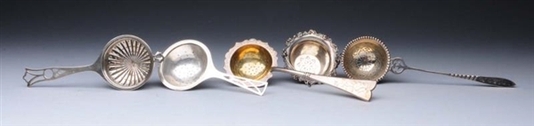 GROUP OF 5: STERLING SILVER TEA STRAINERS.        