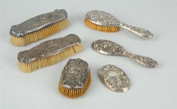 LOT OF 6: STERLING SILVER HAIR BRUSHES.           