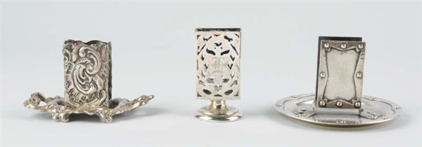 LOT OF 3: STERLING SILVER MATCH HOLDERS.          