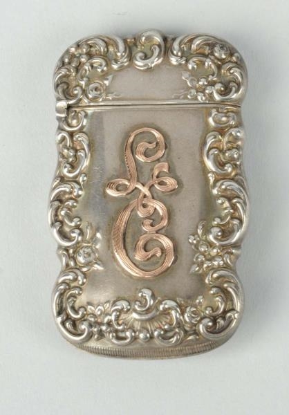 STERLING SILVER MATCH SAFE WITH GOLD OVERLAY.     