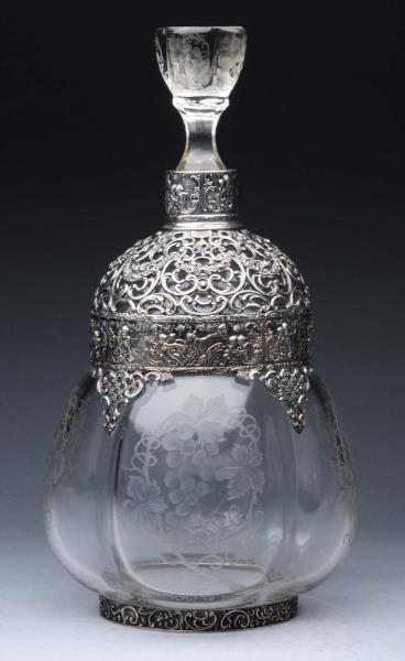 LARGE CONTINENTAL SILVER- MOUNTED DECANTER        