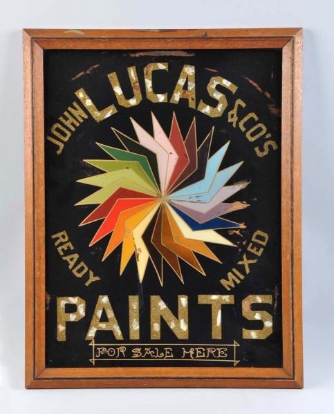LUCAS PAINTS REVERSE PAINTING ON GLASS SIGN.      