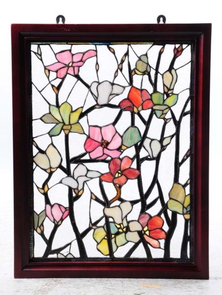 STAINED WINDOW GLASS WITH FLORAL MOTIF.           