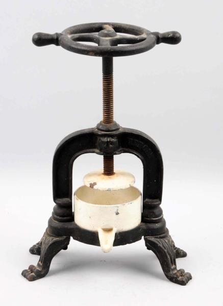 1880S – 90S CAST IRON & PORCELAIN FRUIT JUICER.   