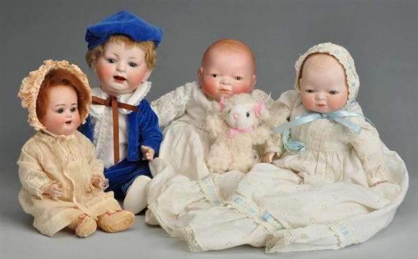 LOT OF 4: BABY DOLLS WITH BISQUE HEADS.           