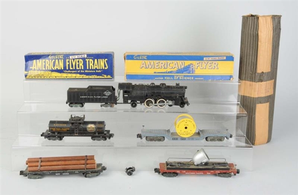 AMERICAN FLYER 303 LOCO & 4 FREIGHT CARS.         