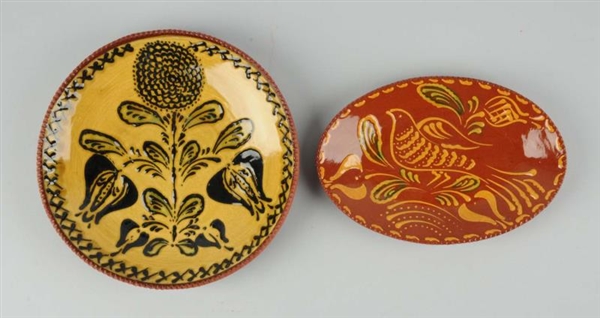 LOT OF 2: NED FOLTZ REDWARE PLATES.               