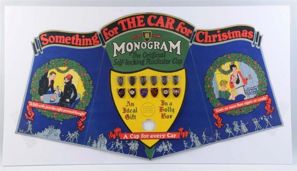 1920’S MONOGRAM RADIATOR CAP CARDBOARD DISPLAY.   