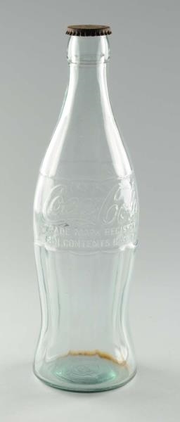LARGE COKE DISPLAY BOTTLE WITH CAP.               