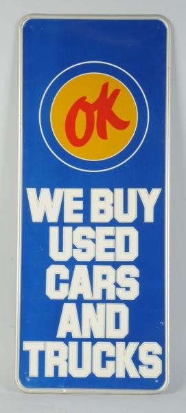 (CHEVROLET) OK USED CARS AND TRUCKS SIGN.         