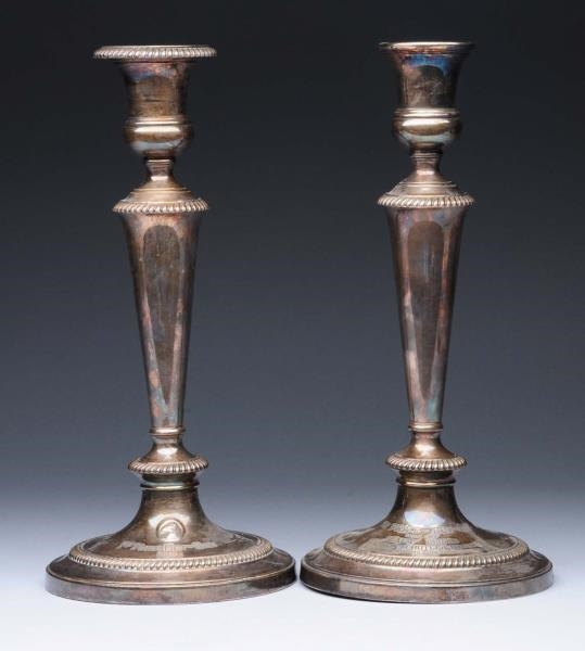 PAIR OF ENGLISH SILVER PLATED CANDLESTICKS.       
