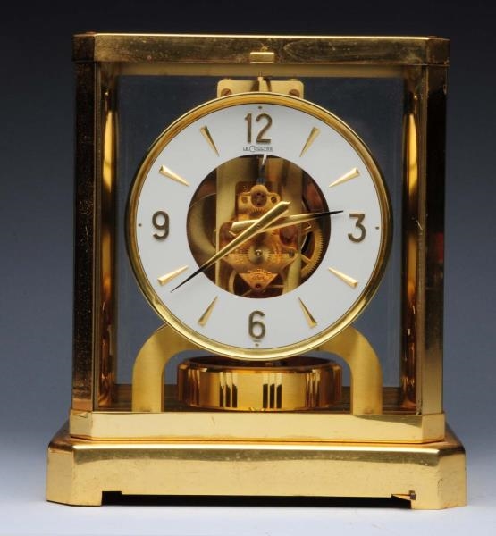 LE COULTRE CLOCK WITH PERPETUAL PENDULUM.         