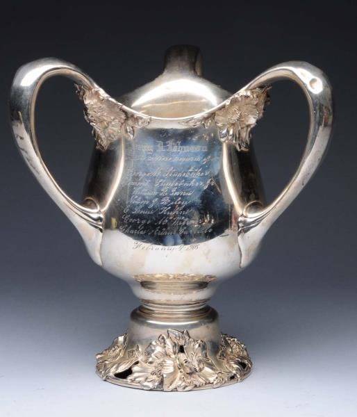 STERLING THREE-HANDLED TROPHY CUP.                