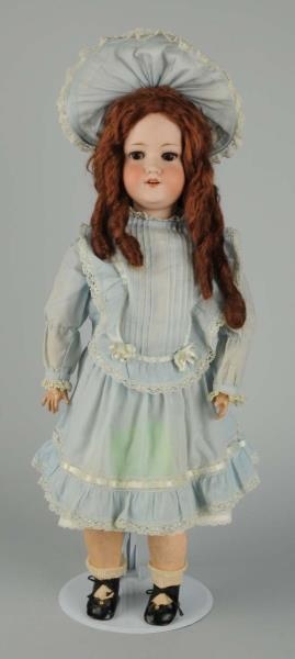 LARGE BISQUE HEAD DOLLY-FACE DOLL.                
