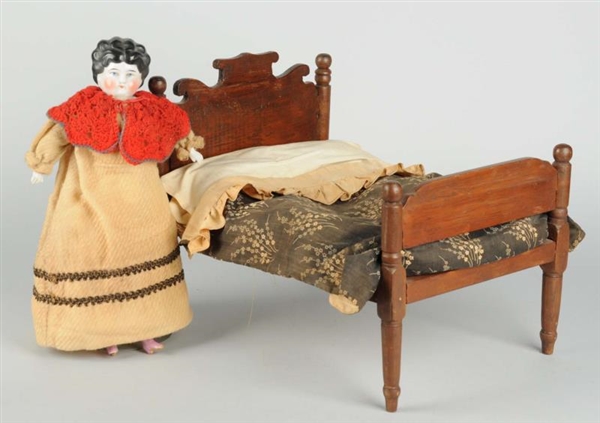 CHINA HEAD DOLL WITH BED.                         