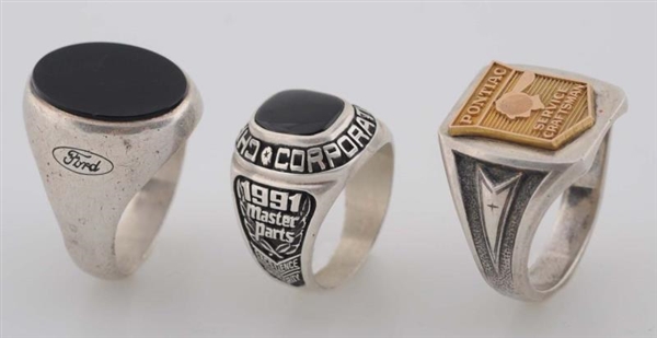 LOT OF 3: MENS AUTOMOTIVE RELATED RINGS.         
