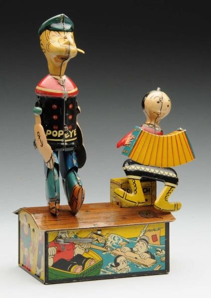 TIN LITHO WIND-UP POPEYE ROOF DANCING TOY.        