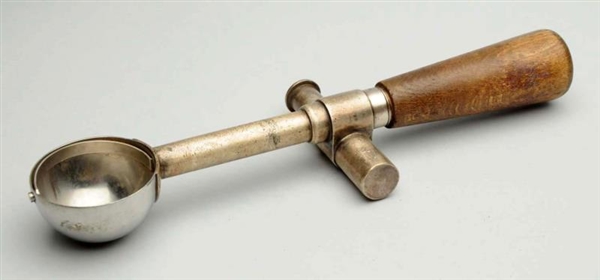 EARLY SIDE THUMB-OPERATED ICE CREAM SCOOP.        