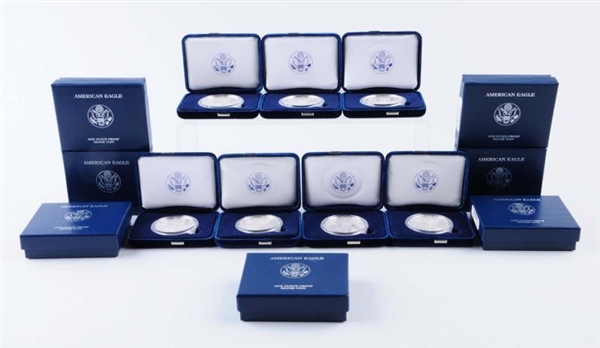 LOT OF 7: AMERICAN SILVER EAGLES IN BLUE BOXES.   