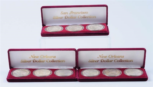 LOT OF 9: MORGAN SILVER DOLLARS IN CASES.         
