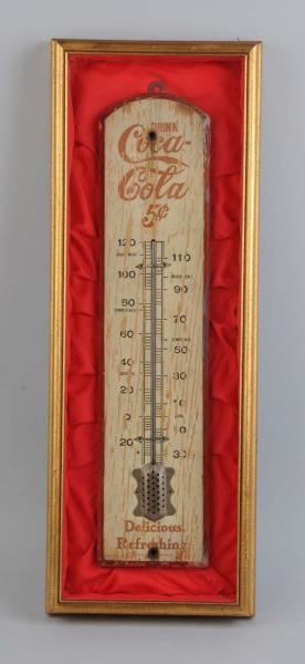 EARLY WOODEN COCA-COLA THERMOMETER.               