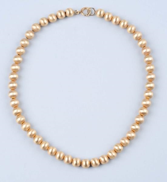 GOLD BEAD NECKLACE.                               