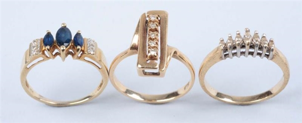 LOT OF 3: GOLD RINGS.                             