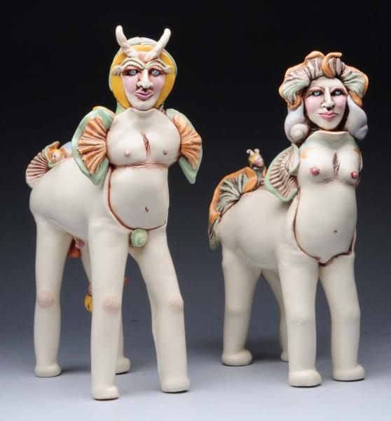 LOT OF 2: CERAMIC HORSES WITH HUMAN ELEMENTS.     