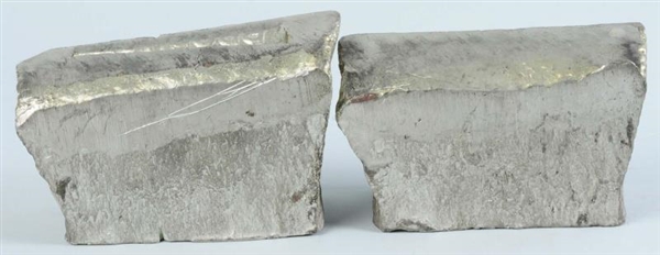 LOT OF 2: SILVER & OTHER METAL INGOTS.            