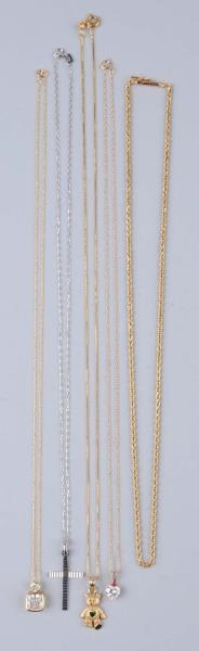 LOT OF 5: GOLD NECKLACES.                         