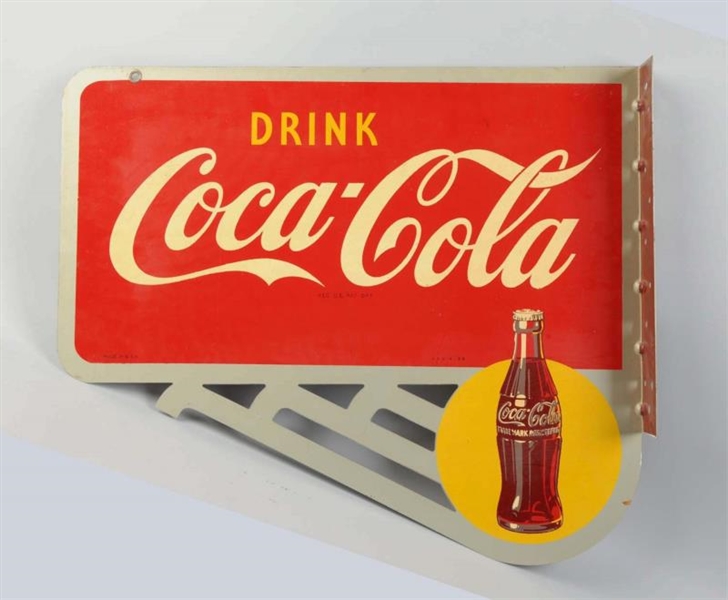 1948 COCA-COLA TIN FLANGE WITH CUT-OUTS.          