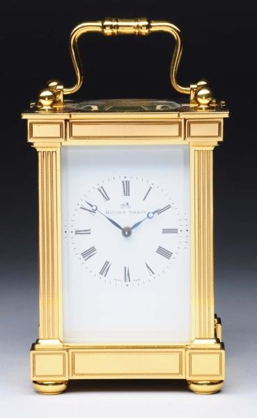 MATTHEW NORMAN CARRIAGE CLOCK WITH CASE.          