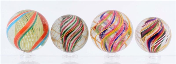 LOT OF 4: LARGE SWIRL MARBLES.                    