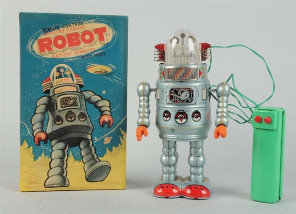 JAPANESE BATTERY - OPERATED TIN LITHO DOOR ROBOT. 