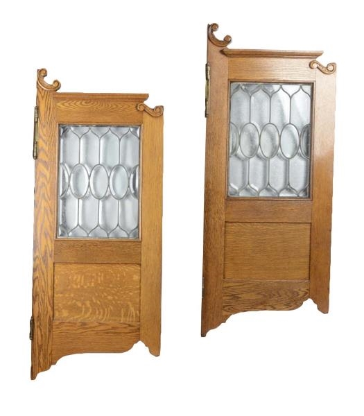 PAIR OF FANCY WOOD AND LEADED GLASS SALOON DOORS  