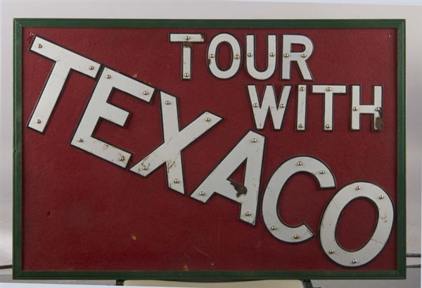 TOUR WITH TEXACO SIGN IN FRAME                    