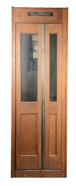 OAK TELEPHONE BOOTH WITH ROTARY PHONE             