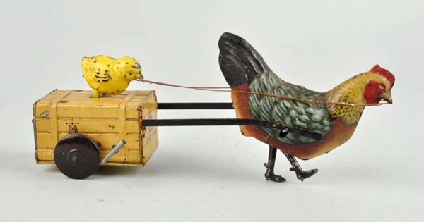 GERMAN TIN LITHO WIND UP HEN & CHICK TOY.         