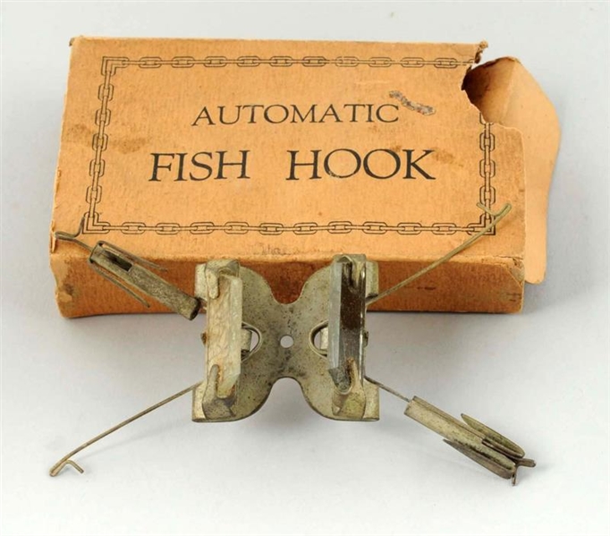 THE AUTOMATIC FISH HOOK IN ITS ORIGINAL BOX.      