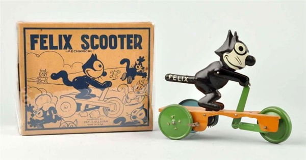 NIFTY TIN LITHO WIND-UP FELIX THE CAT SCOOTER TOY.