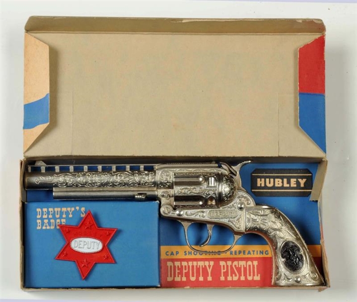 HUBLEY DEPUTY GUN & BADGE IN BOX.                 