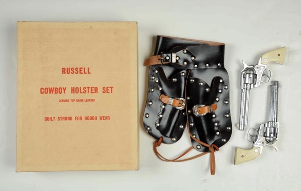 RUSSELL GUN & HOLSTER SET IN BOX.                 
