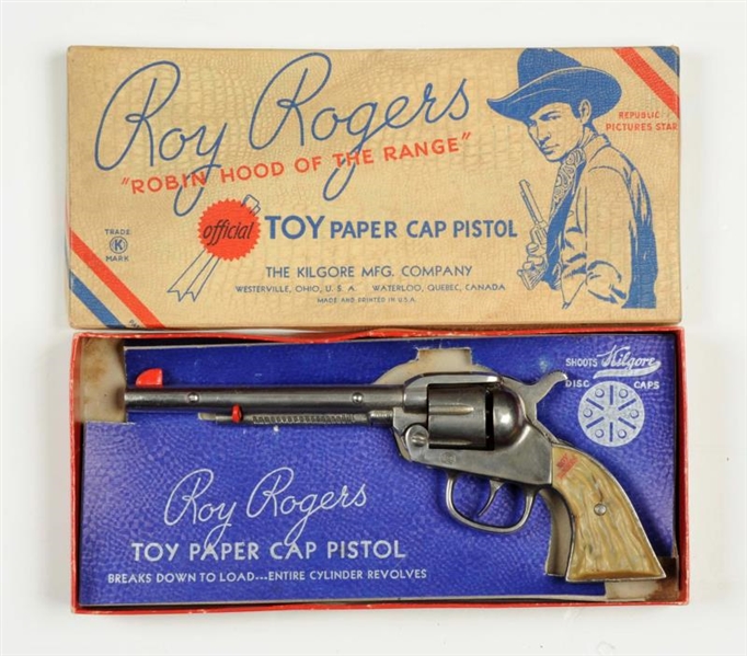 ROY ROGERS CAST IRON GUN IN BOX.                  