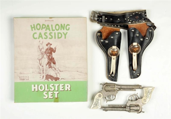 HOPALONG CASSIDY DOUBLE GUN & HOLSTER SET IN BOX. 