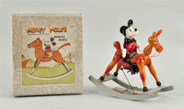 DISNEY CELLULOID MICKEY ON WOODEN ROCKING HORSE.  