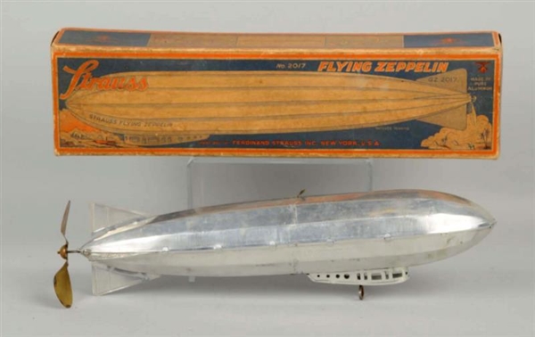 STRAUSS TIN WIND-UP FLYING ZEPPELIN TOY.          