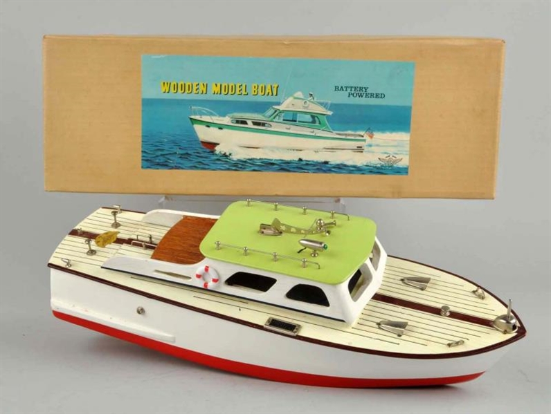 JAPANESE BATTERY-OPERATED WOODEN MODEL BOAT.      