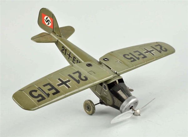 GERMAN TIN LITHO WIND-UP AIRPLANE TOY.            