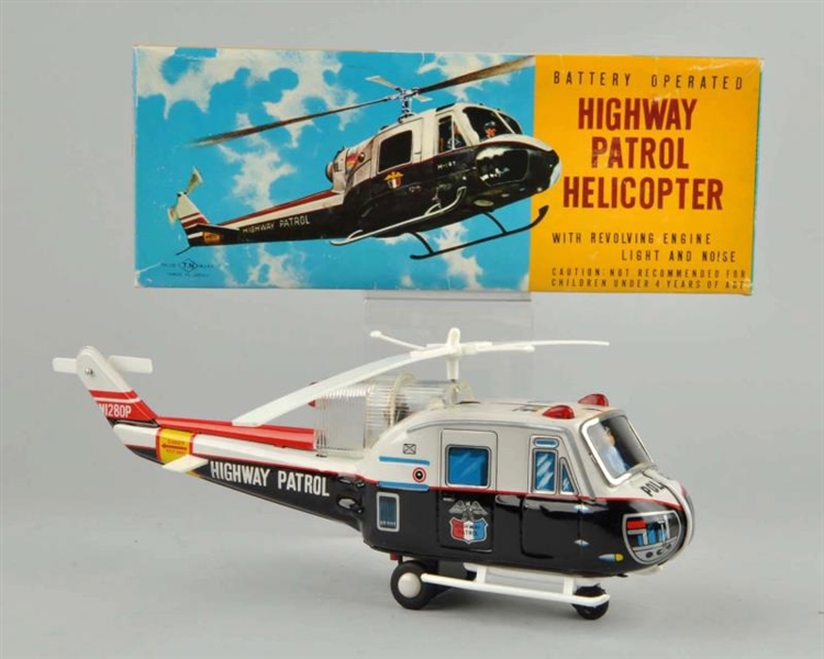 JAPANESE TIN LITHO HIGHWAY PATROL HELICOPTER TOY. 