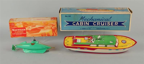 LOT OF 2: SUBMARINE AND BOAT TOYS WITH BOXES.     